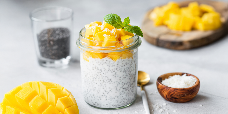 Tropical Protein Chia Pudding with Mango & Coconut Flakes